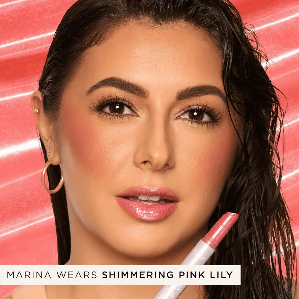 Tarte Maracuja Juicy Lip Vinyl in Shimmering Pink Lily - Lebanon - Makeup Germany tarte maracuja juicy lip vinyl gloss shimmering pink lily Tarte Maracuja Juicy Lip Vinyl Shimmering Pink Lily Lebanon for sale in Lebanon - Tarte Maracuja Juicy Lip Vinyl click pen tube in shade Shimmering Pink Lily showing juicy glossy tint and packaging