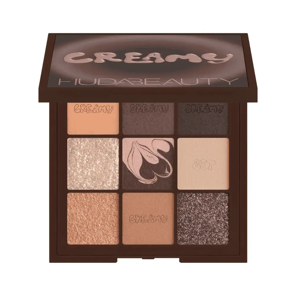 HUDA BEAUTY Creamy Obsessions Eyeshadow Palette Neutral Brown - Lebanon - Makeup Germany HUDA BEAUTY Creamy Obsessions Eyeshadow Palette Neutral Brown featuring nine cream-to-powder, metallic, marble and matte eyeshadows in beige, brown, gold, pink and purple tones