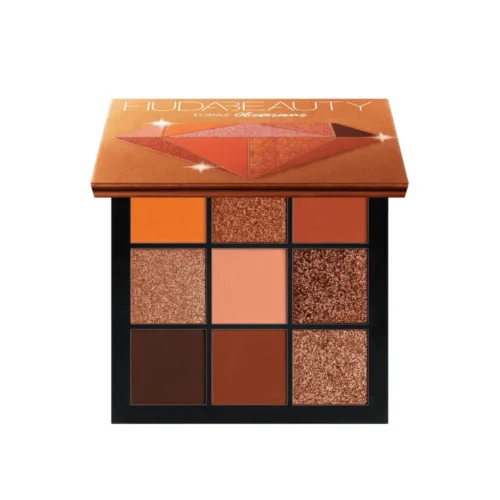 Huda Beauty Topaz Obsessions Eyeshadow Palette featuring nine warm-toned eyeshadows with five matte and four duo-chrome shimmer shades in orange, amber, bronze, rose gold and golden hues
